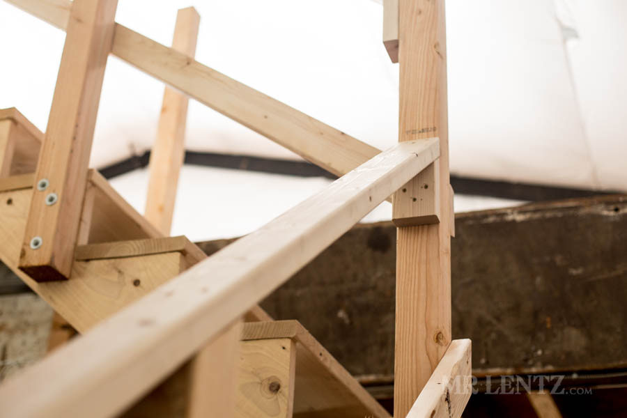 wood railing on workshop stairs