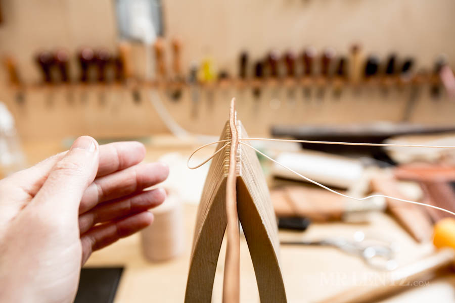 pulling thread through leather goods