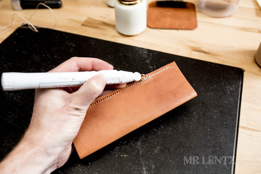 burning the thread after finishing sewing leather