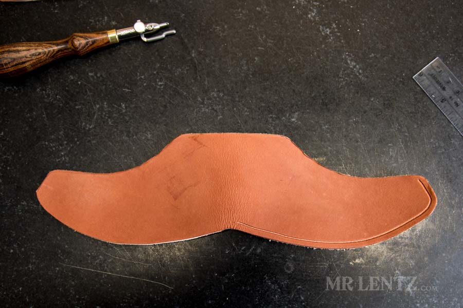 finished stitch groove on axe sheath