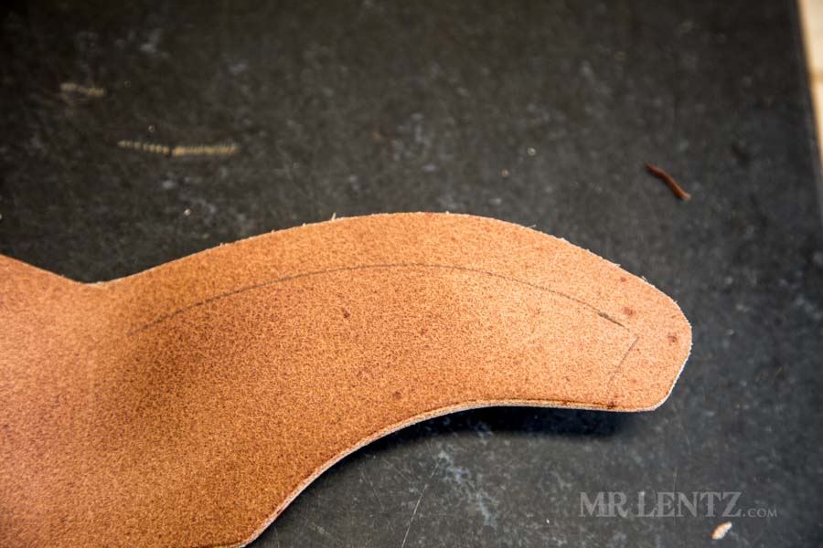 welt line on interior of axe sheath