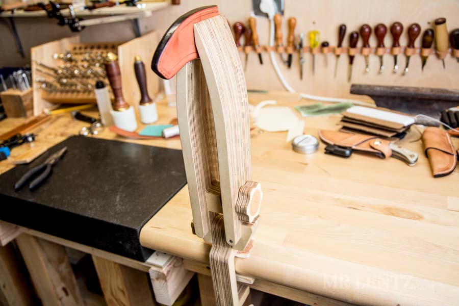 stitching pony holding axe sheath