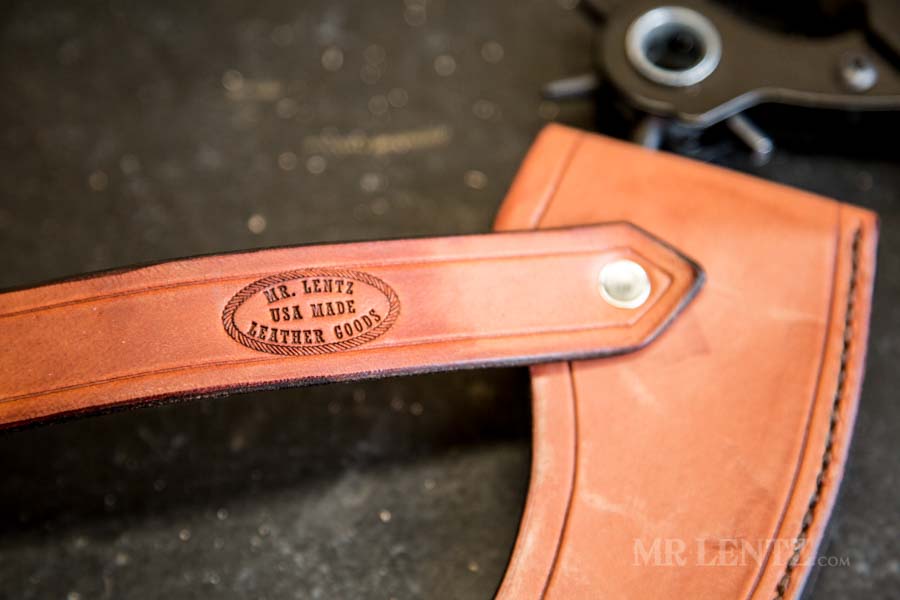 maker stamp on strap of axe sheath