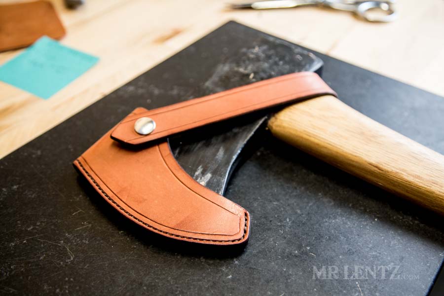 axe sheath with retaining strap before final finish