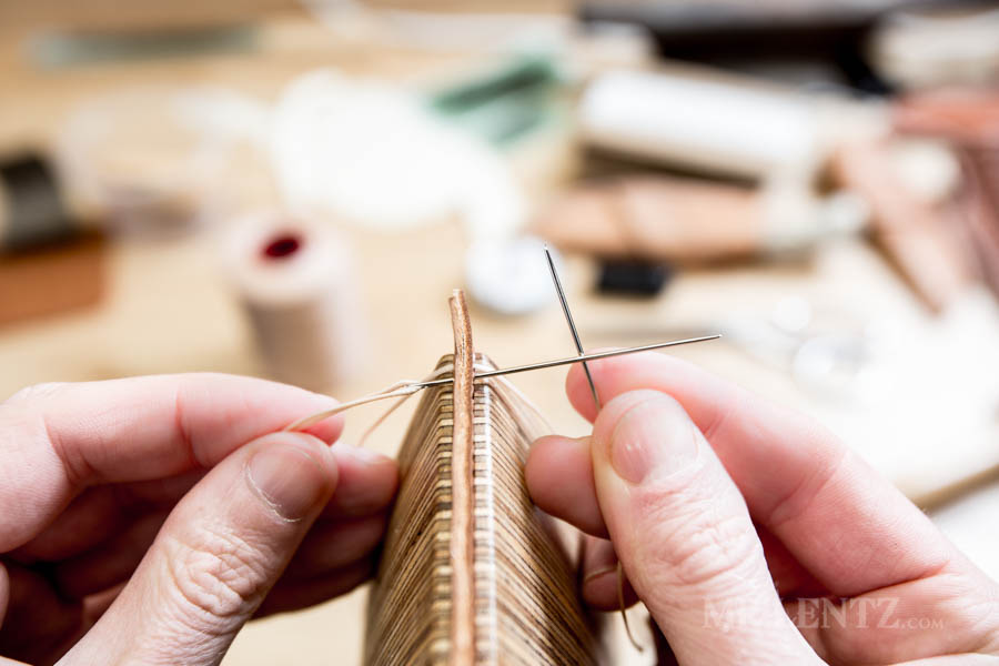 using two needles to sew leather goods