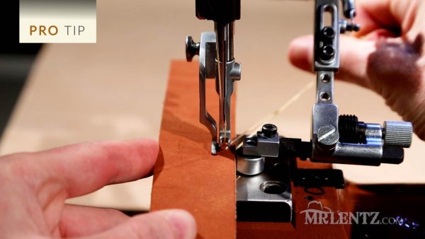 using a roller guide for sewing belts on a leather sewing machine