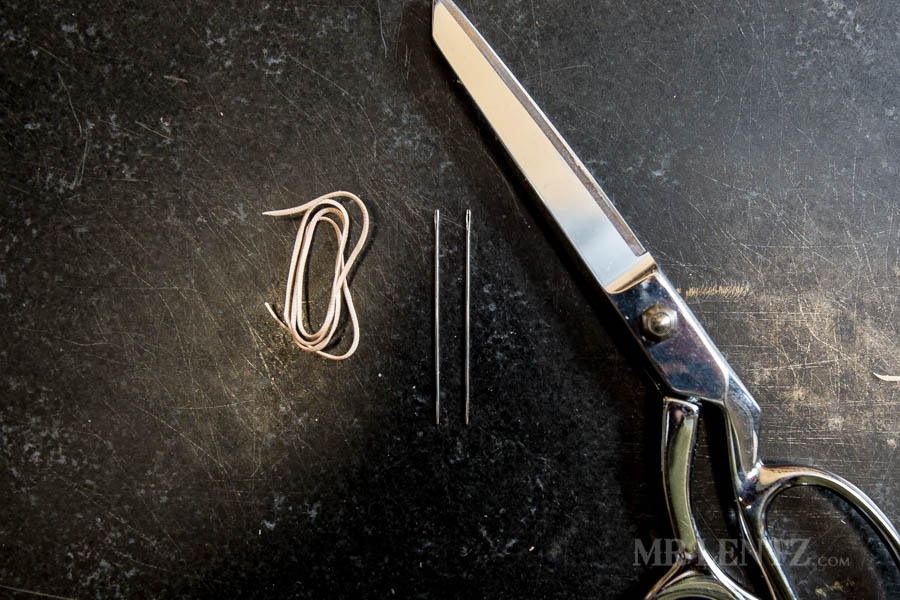 needles thread and scissors for sewing leather