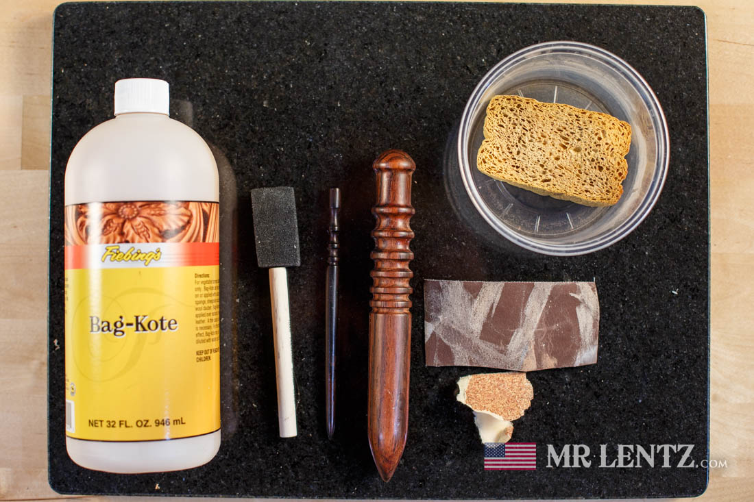 tools used in applying resin finish to a leather holster