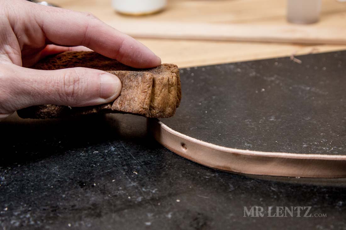 wetting the edge of the retaining strap