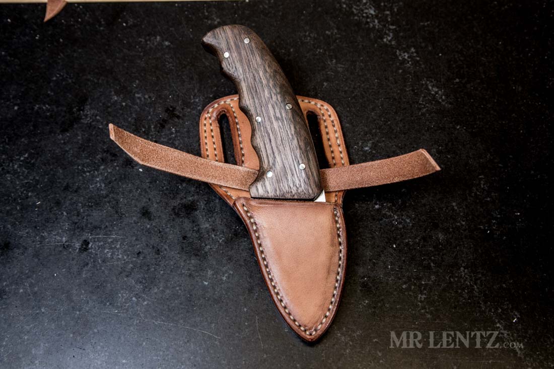 test fitting the knife with retaining strap