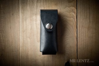 black leatherman multi tool sheath with silver finish