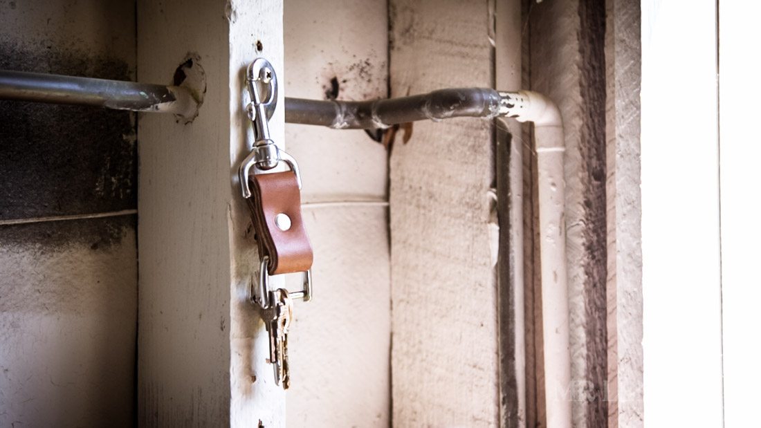 leather keychain hung on wall