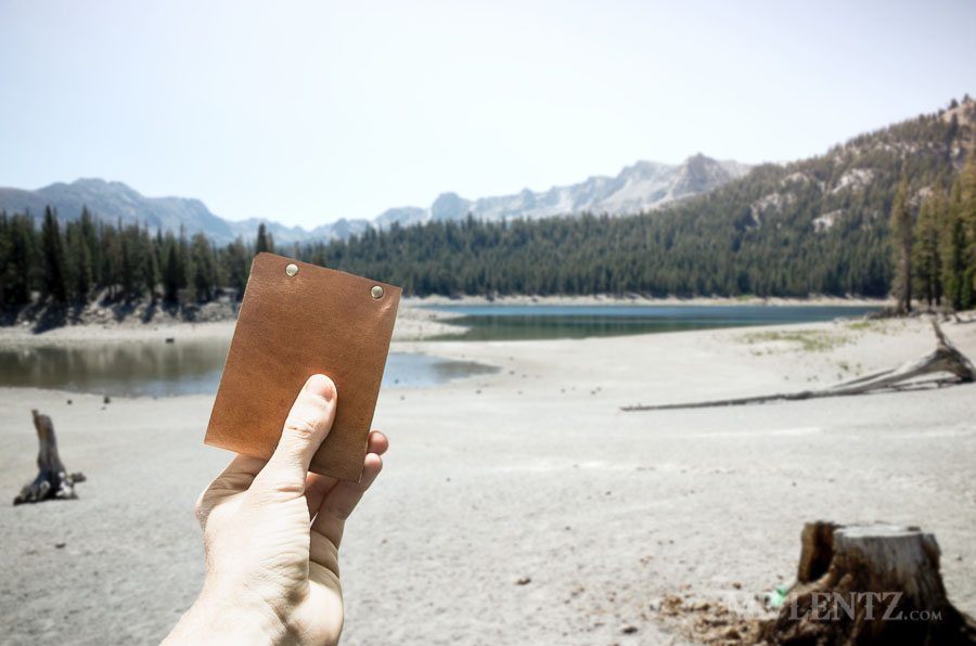 Leather wallet and lake