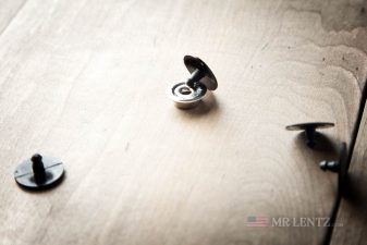 black snap plastic backing plastic snap protector