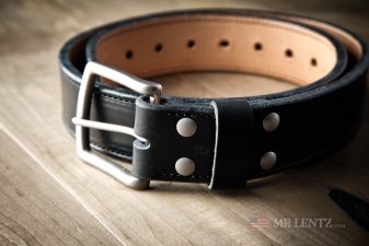 black leather reinforced gun belt