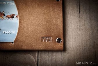 thin bifold leather wallet stamped