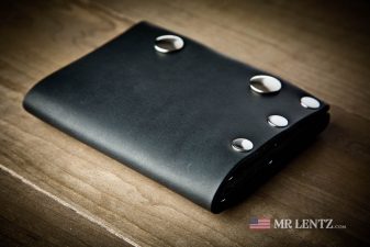 side of leather black trifold wallet