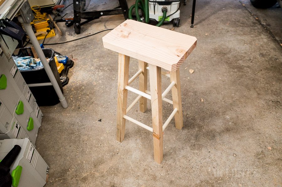 measuring a wood stool